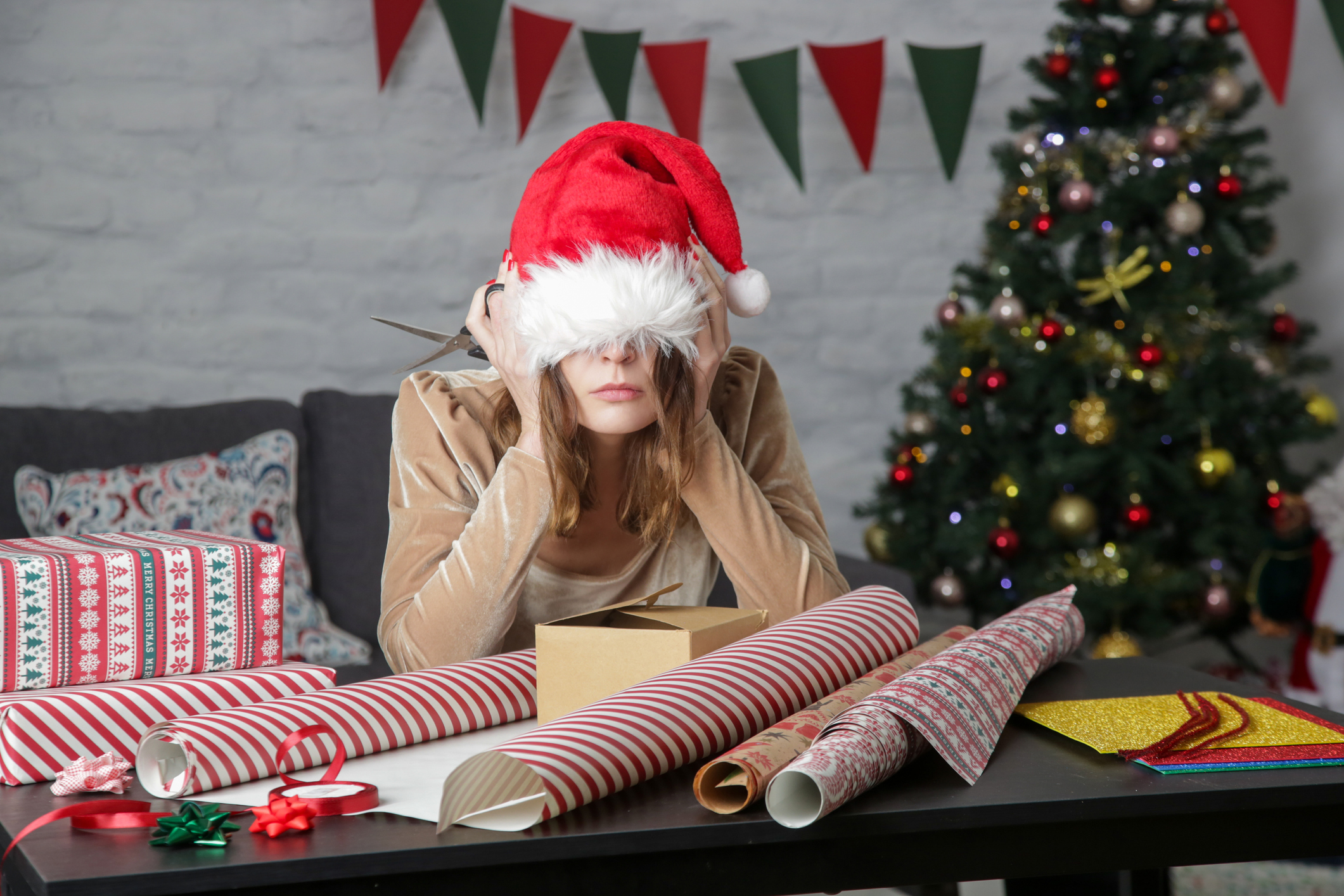 woman overwhelmed by holiday tasks